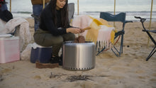 Load image into Gallery viewer, Lighting the Ecoflame Smokeless fire pit 
