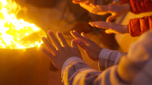 Load image into Gallery viewer, warming hands on Ecoflame Smokeless fire pit 
